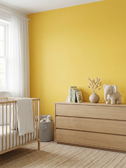 Quarto infantil com parede amarela Del Sol da cartela Lukscolor